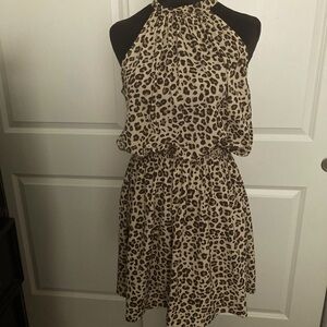 Leopard print dress size medium. Really pretty tie in the back. Cinch waistline.